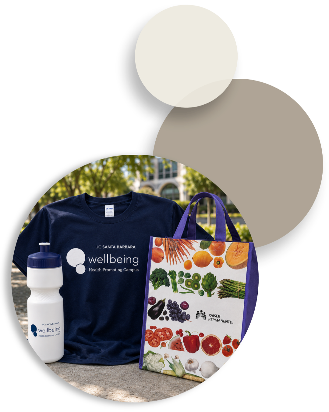 UC Santa Barbara Wellbeing T-shirt, water bottle, and Kaiser Permanente produce tote displayed outdoors.